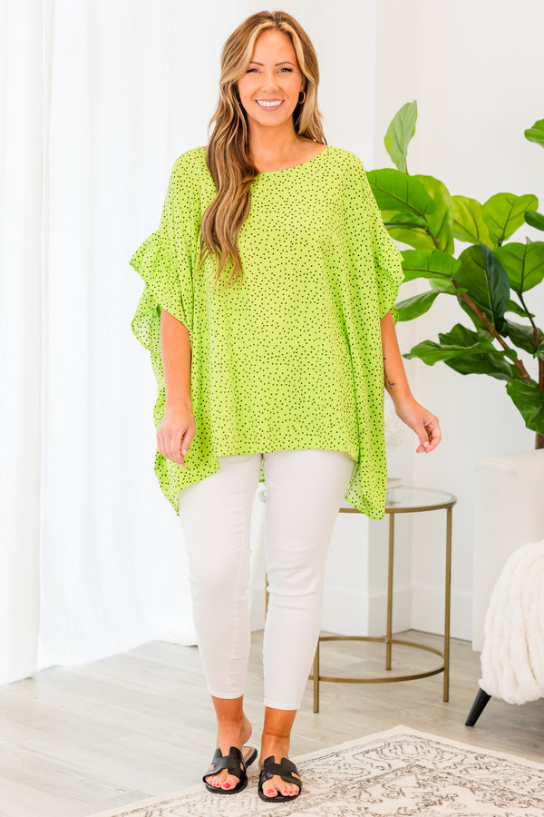 Chic Soul plus size clothing, short-sleeve lime green flowy top with black polka dotted pattern 