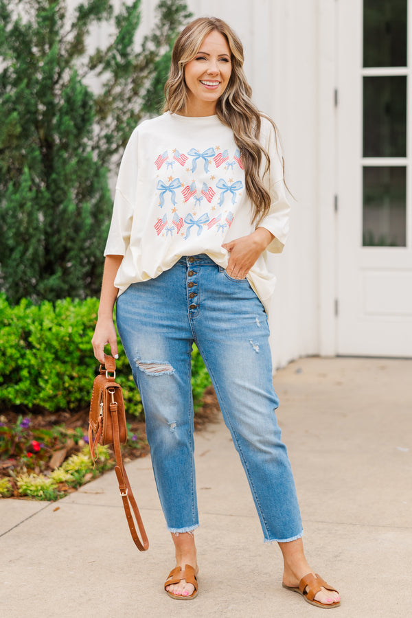 Chic Soul plus size clothing, ivory short sleeve boyfriend tee with american flag and blue bow graphic