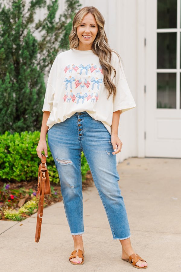 Chic Soul plus size clothing, ivory short sleeve boyfriend tee with american flag and blue bow graphic