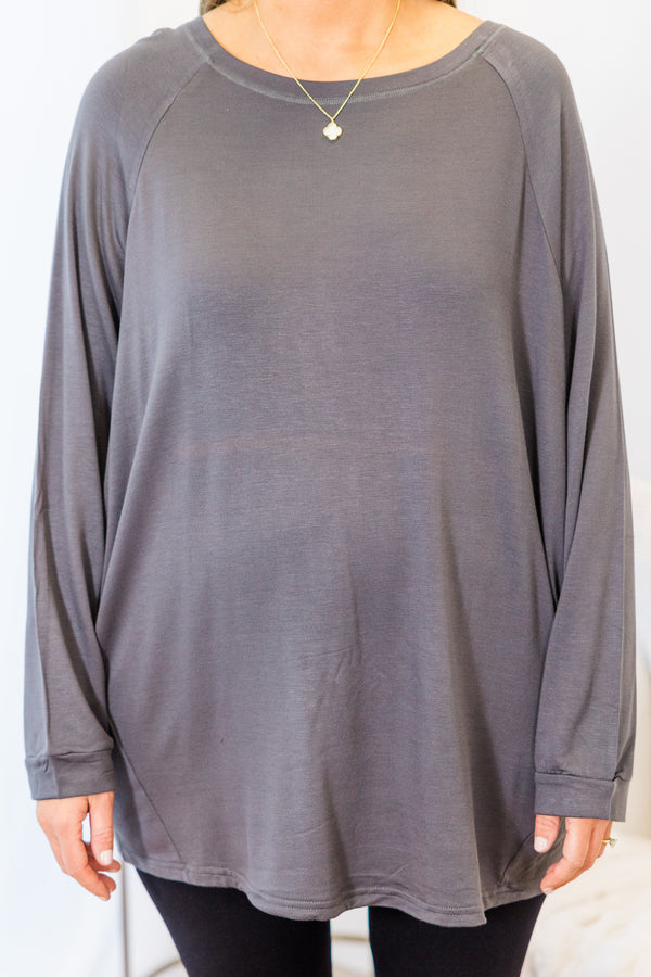 Plus Size charcoal grey fleece-lined dolman tunic with a relaxed fit, long sleeves, and round neck.
