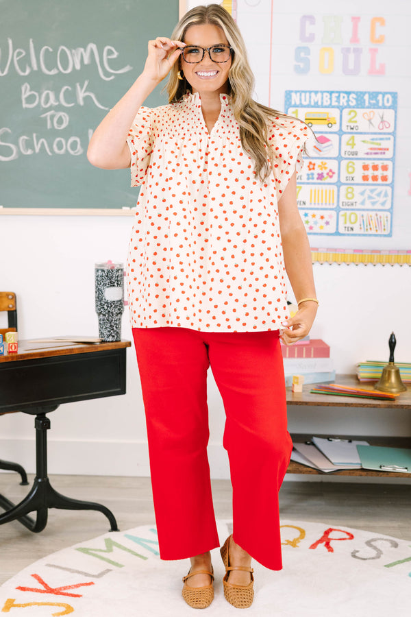 Plus Size red high rise crop wide leg jeans with a frayed hemline.