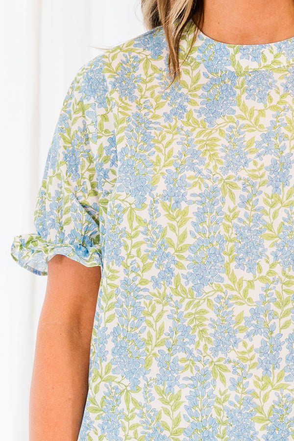 Chic Soul plus size clothing, short sleeve blue floral top with ruffle detail on sleeves with slight puff sleeve