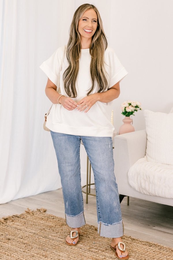Chic Soul plus size clothing,  short-sleeve ivory top with a textured geometric pattern with subtle raised lines in a diagonal grid design and a high-scoop-neckline