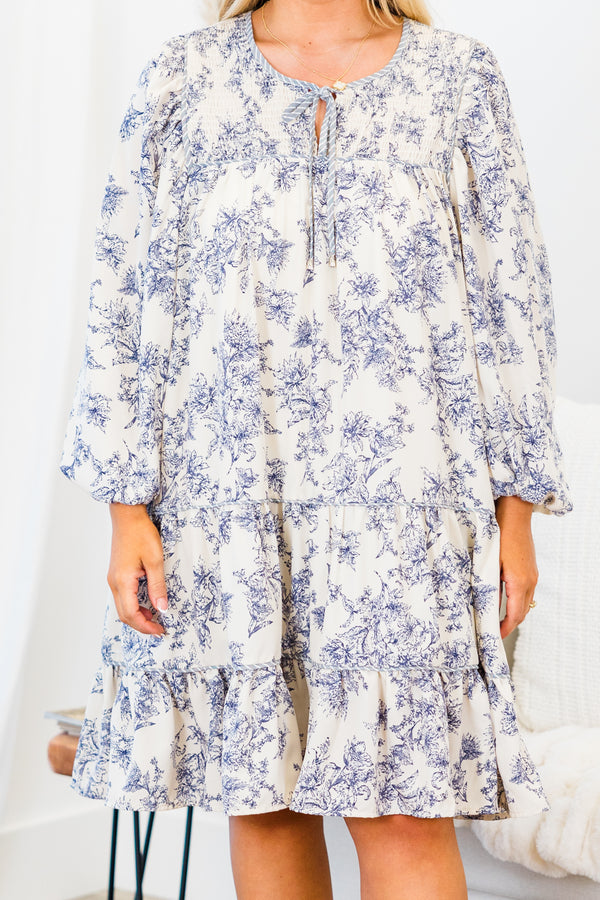 Chic Soul plus size clothing, blue long sleeve floral tiered mini dress with smocked top detail with tie detail on round neckline with cuffed bubble sleeves