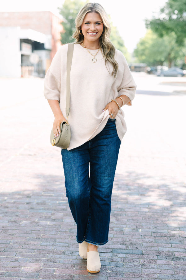 Plus Size taupe short sleeve sweater with a crew neckline and relaxed fit in a soft knit fabric.