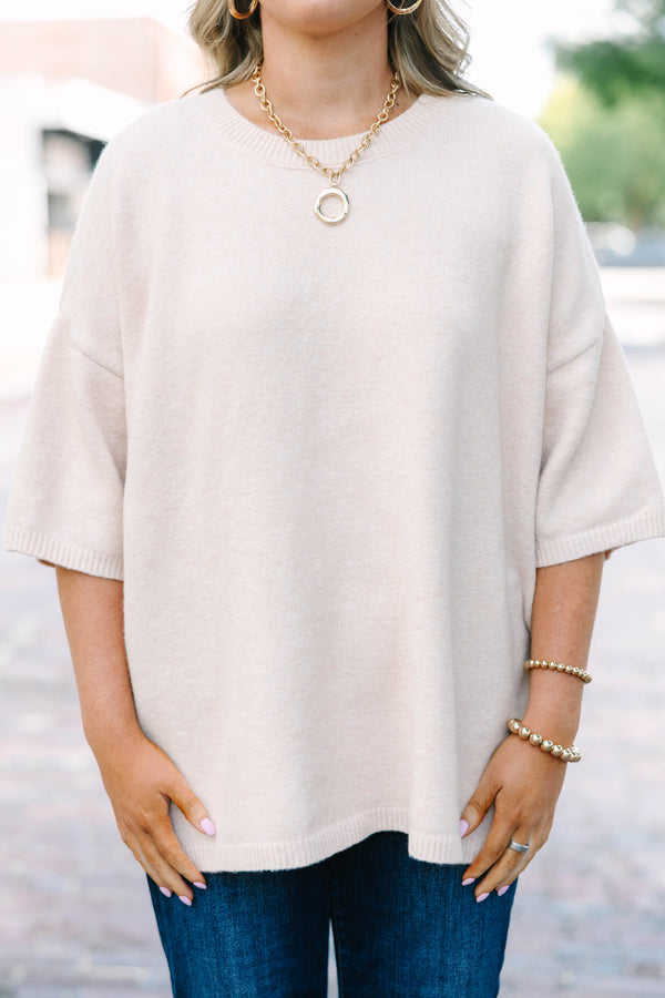 Plus Size taupe short sleeve sweater with a crew neckline and relaxed fit in a soft knit fabric.