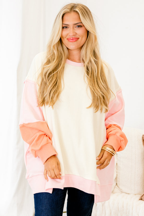 Chic Soul plus size clothing, salmon colored pullover with color block details on the sleeves and at the end of the shirt 
