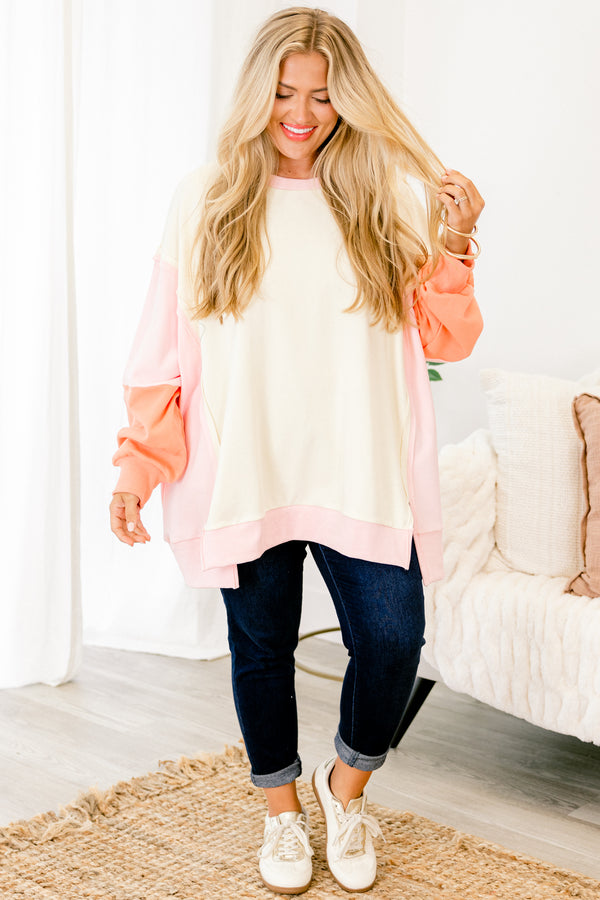 Chic Soul plus size clothing, salmon colored pullover with color block details on the sleeves and at the end of the shirt 