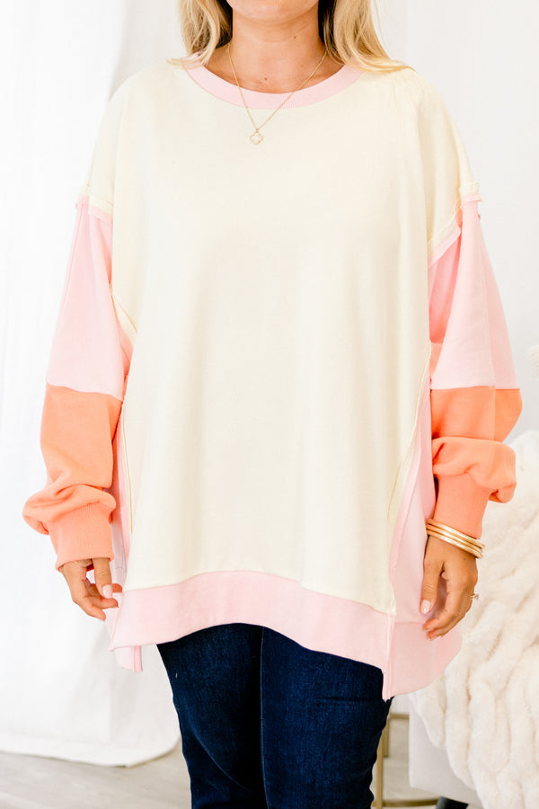 Chic Soul plus size clothing, salmon colored pullover with color block details on the sleeves and at the end of the shirt 