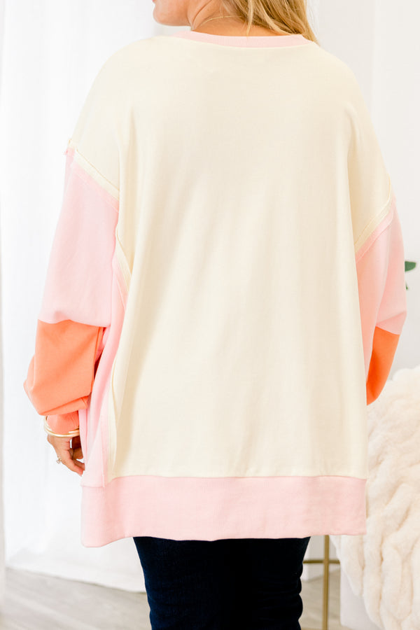 Chic Soul plus size clothing, salmon colored pullover with color block details on the sleeves and at the end of the shirt 