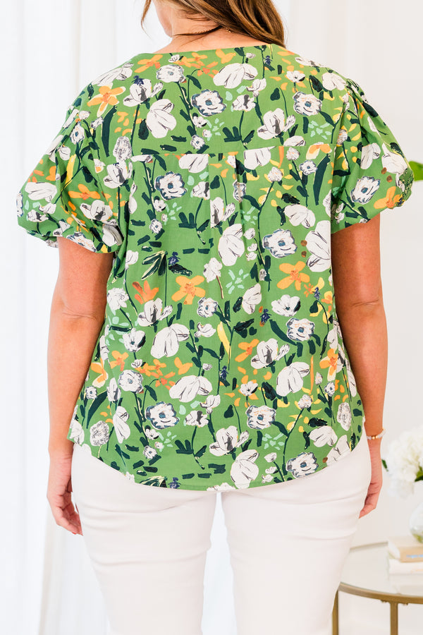 Chic Soul plus size clothing, short sleeve green top with white and yellow floral details with tassels on the collar 