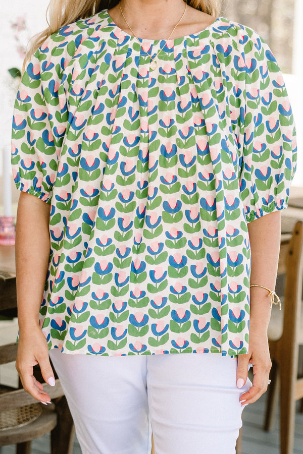 Chic Soul plus size clothing, green short sleeve top with pink/blue/green tulip design with round neckline with puff cuffed sleeves