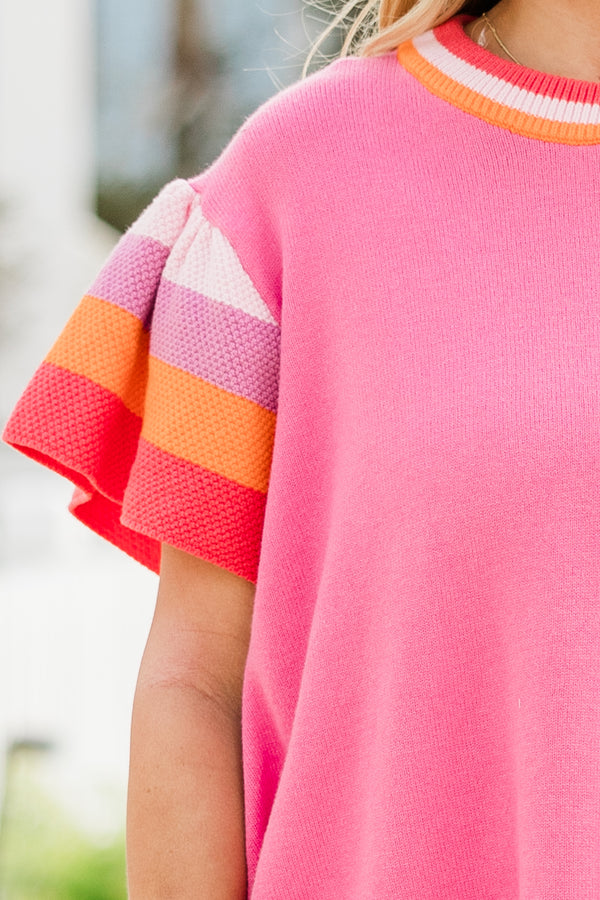 Plus Size pink knit sweater with color block flutter sleeves and a striped crew neckline.