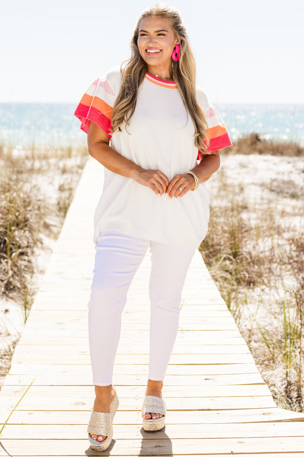 Plus Size white knit sweater with colorful striped flutter sleeves and a matching crew neckline.