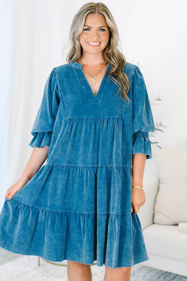 Plus Size blue corduroy tiered dress with a V-neckline and ruffled elbow-length sleeves.