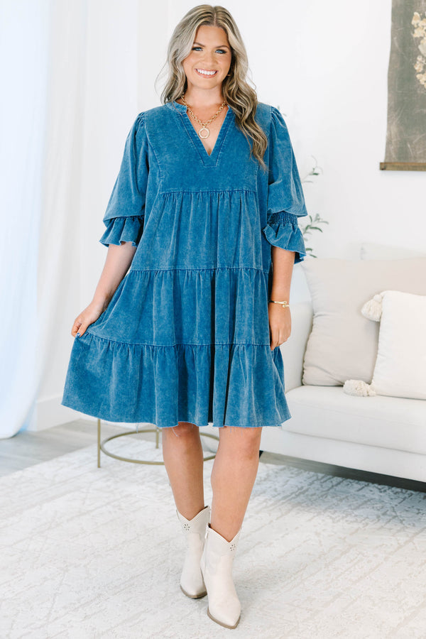 Plus Size blue corduroy tiered dress with a V-neckline and ruffled elbow-length sleeves.