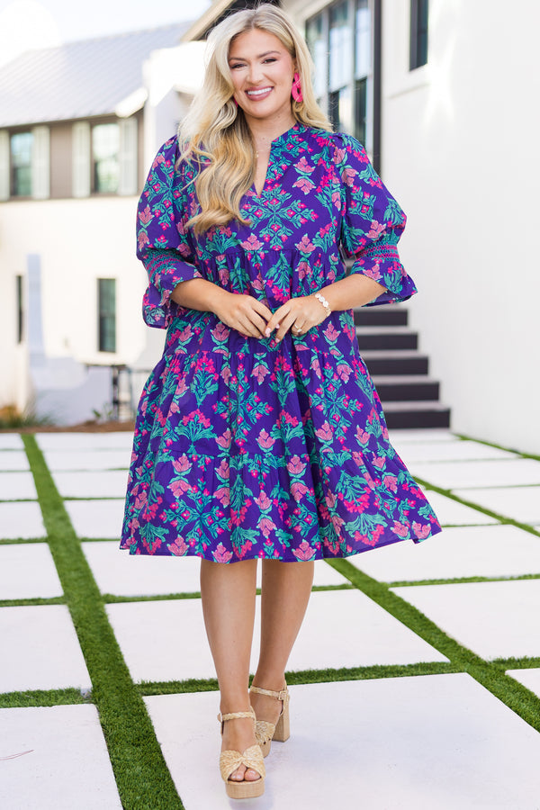 Chic Soul plus size clothing, blue baby doll dress with half sleeves that have a ruffle at the end of each sleeve as well as a multi color floral block pattern throughout 