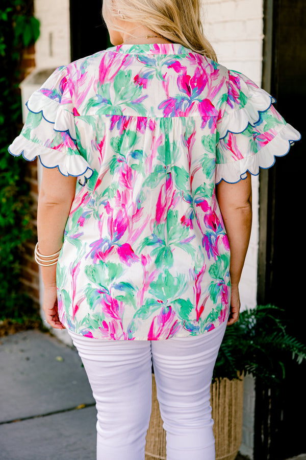 Chic Soul Plus size clothing, green blouse with a abstract flora pattern and flutter sleeves that have white scalloped ruffles on them that are outlined in blue stitching 
