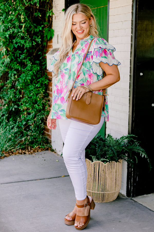 Chic Soul Plus size clothing, green blouse with a abstract flora pattern and flutter sleeves that have white scalloped ruffles on them that are outlined in blue stitching 
