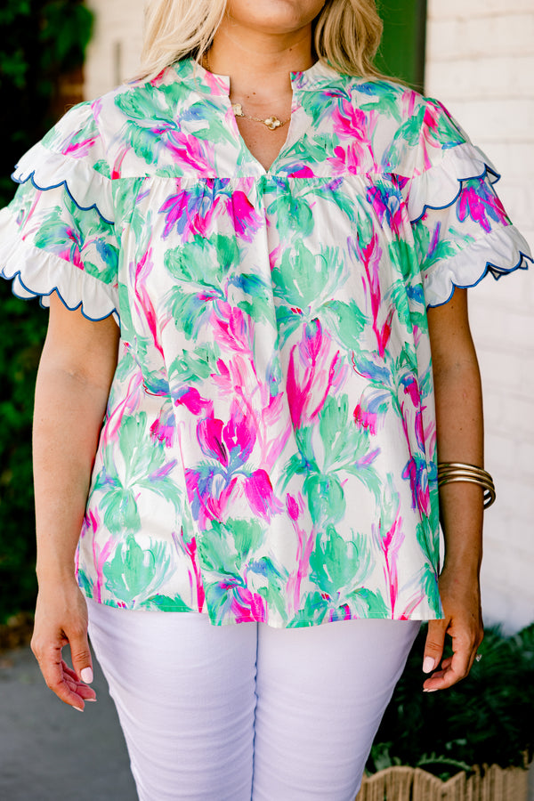 Chic Soul Plus size clothing, green blouse with a abstract flora pattern and flutter sleeves that have white scalloped ruffles on them that are outlined in blue stitching 
