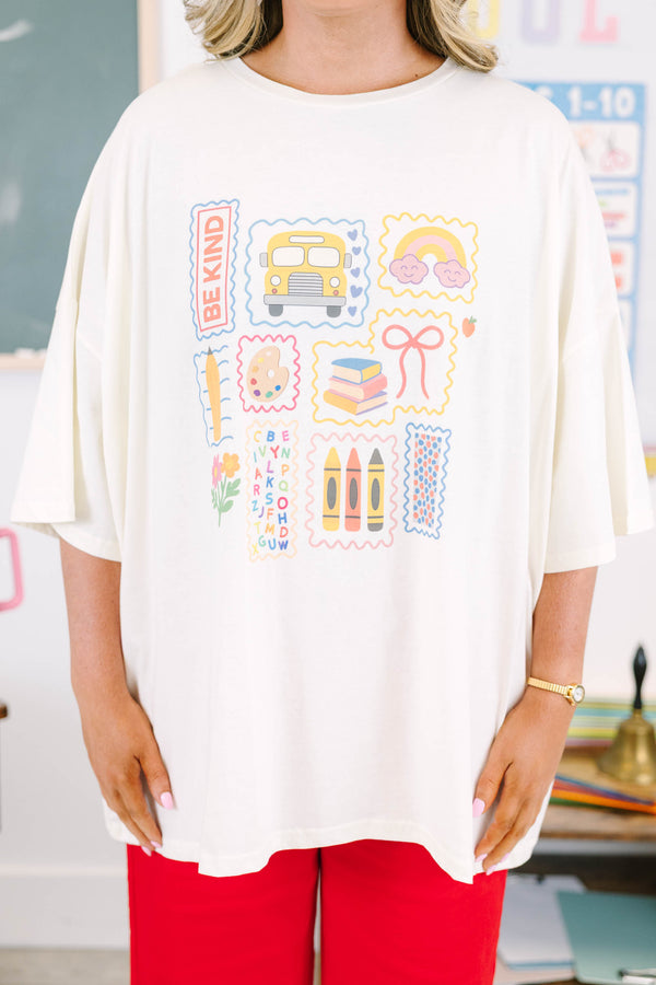 Plus size ivory oversized boyfriend tee with colorful school-themed graphics.