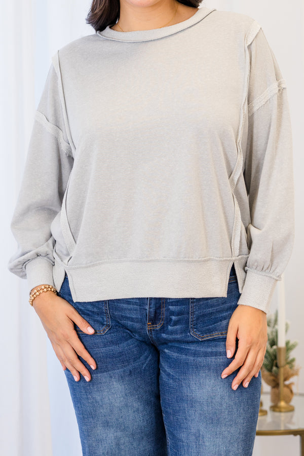 
Chic Soul plus size clothing, light grey long sleeve sweater with two toned outer stitching detail with round neckline and cuff sleeves with band along bottom with slits on each side
