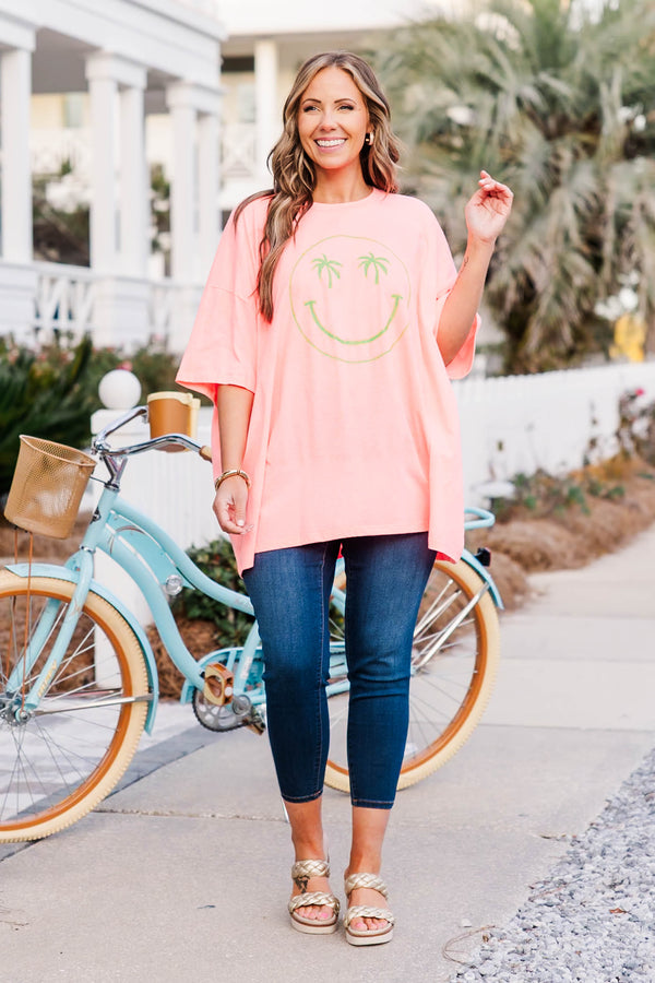 Chic Soul plus size clothing, neon coral pink boyfriend tee with green smiley face with palm trees as both eyes