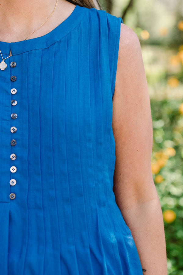 Chic Soul plus size clothing, sleeveless royal blue high-scoop-neckline top with a subtle button detailing and a pleated flare detailing towards the bottom