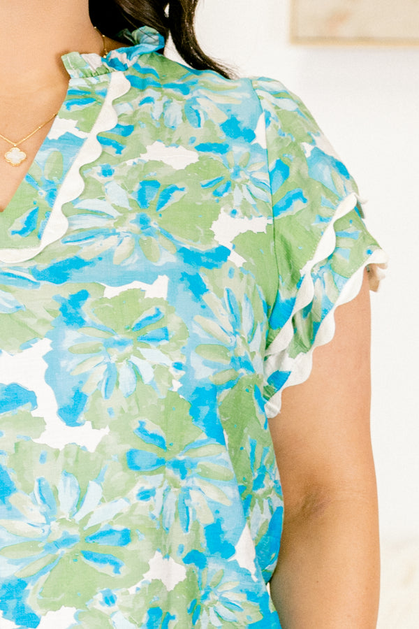 Chic Soul plus size clothing, sage green and bright blue-green watercolor floral top with V-neck and short sleeves