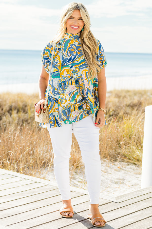 Chic Soul plus size clothing, short-sleeve blue mock neck top with a yellow and blue abstract paisley watercolor pattern