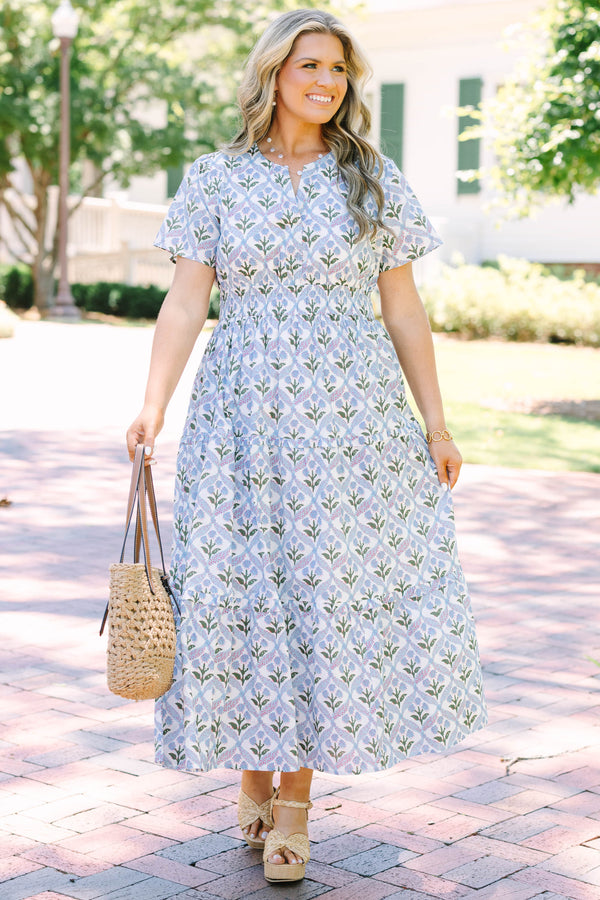 Plus Size blue and white floral print midi dress with short sleeves and a tiered skirt.