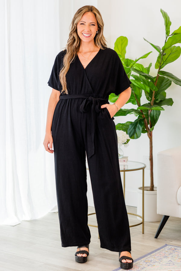 Chic Soul plus size clothing, black jumpsuit with cross over top and tie belt at waist