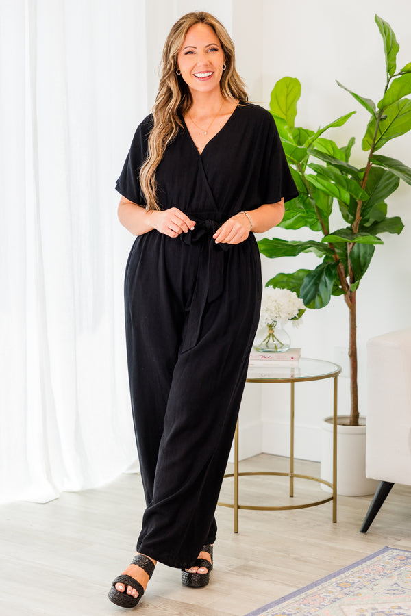 Chic Soul plus size clothing, black jumpsuit with cross over top and tie belt at waist