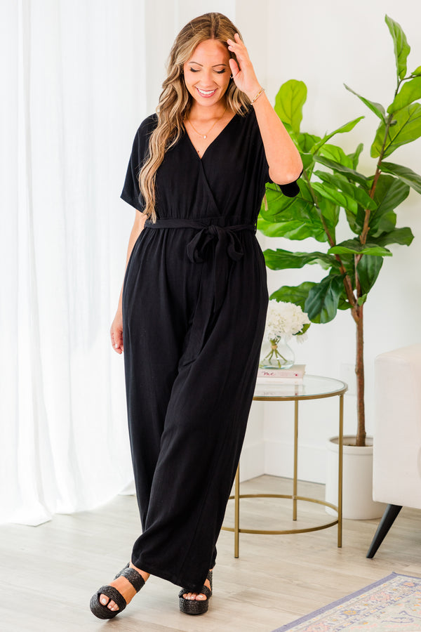 Chic Soul plus size clothing, black jumpsuit with cross over top and tie belt at waist