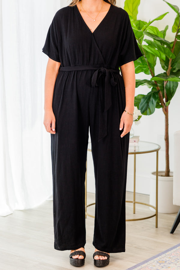 Chic Soul plus size clothing, black jumpsuit with cross over top and tie belt at waist