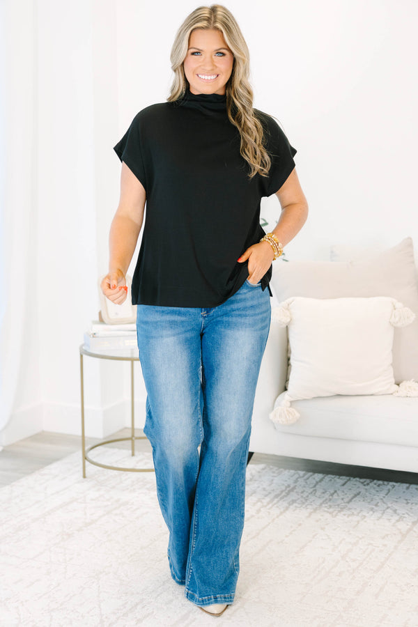 Plus Size black short sleeve mock neck top with a relaxed fit and side slits.