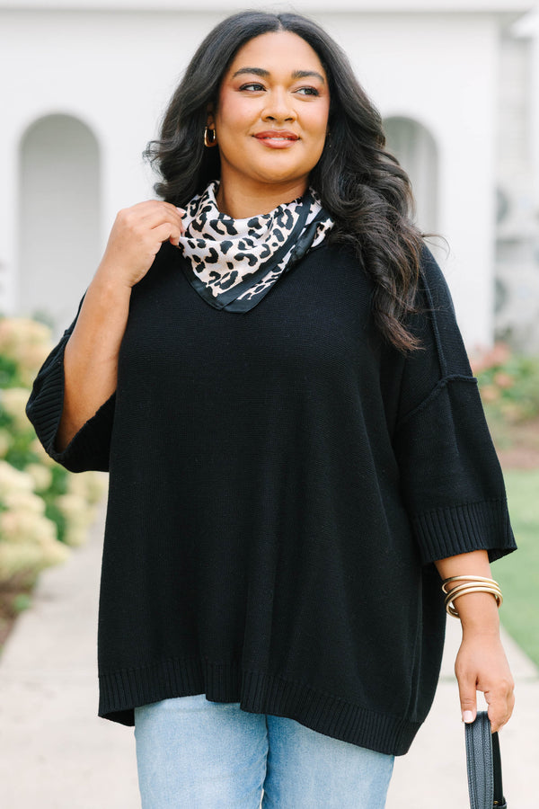 Plus Size black v-neck sweater with three-quarter sleeves and a relaxed fit in a knit fabric.