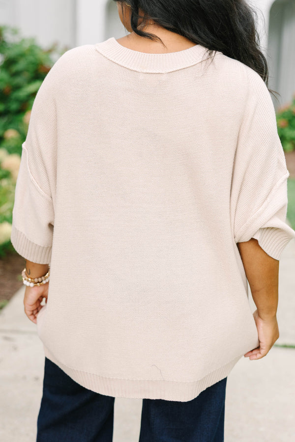 Plus size oatmeal oversized knit sweater with a flowy fit and short sleeves.