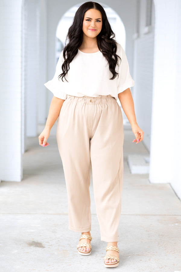 Plus Size taupe pants with an elastic paperbag waist, button detail, and cuffed ankles.