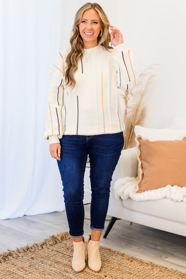 Chic Soul plus size clothing, white long sleeve knit sweater with round neckline and cuff sleeves with outer stitch multicolor vertical stripe detailing