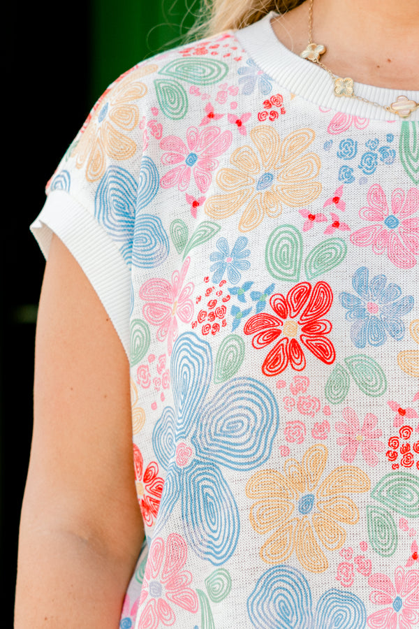 Chic Soul plus size clothing, Multi-color sleeveless top with a floral design all throughout the top 
