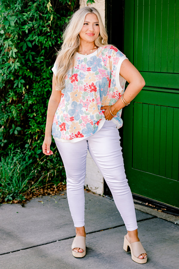 Chic Soul plus size clothing, Multi-color sleeveless top with a floral design all throughout the top 
