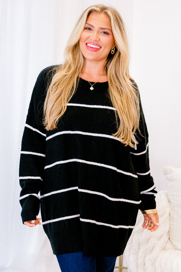 Plus Size black and cream striped sweater with a relaxed fit, crew neckline, and long sleeves.