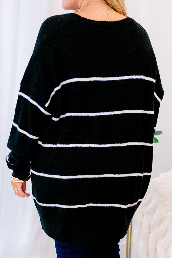 Plus Size black and cream striped sweater with a relaxed fit, crew neckline, and long sleeves.
