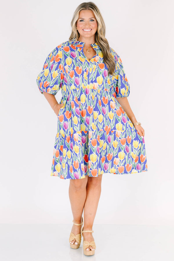 Chic Soul plus size clothing, blue short sleeve tiered mini dress with orange/yellow/pink floral tulip print with v cutout along neckline with puff sleeves