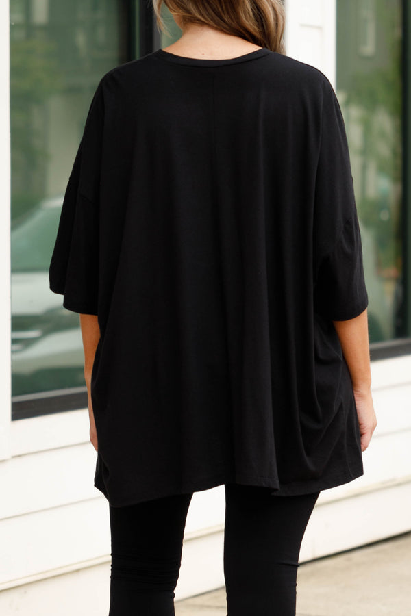 Chic Soul plus size clothing, black oversized tee with a leopard smiley graphic