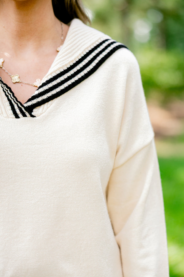 Chic Soul plus size clothing, off-white long sleeve hooded sweater with thin black stripes lining the hem, neckline, and sleeve
