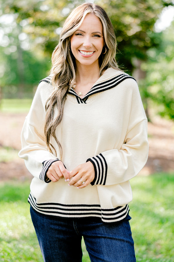 Chic Soul plus size clothing, off-white long sleeve hooded sweater with thin black stripes lining the hem, neckline, and sleeve
