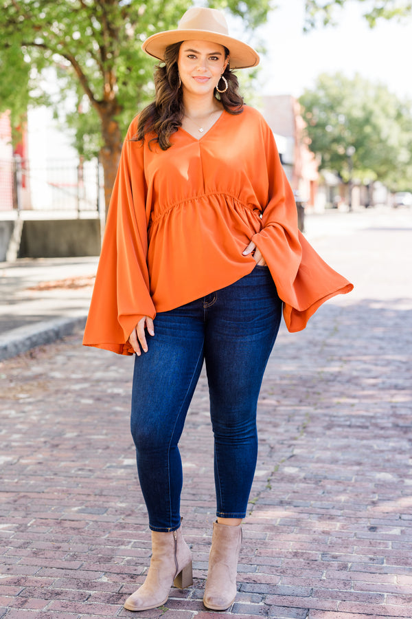 Chic Soul plus size clothing, orange long sleeve flowy top with v neckline and synched waist detail with bell sleeves