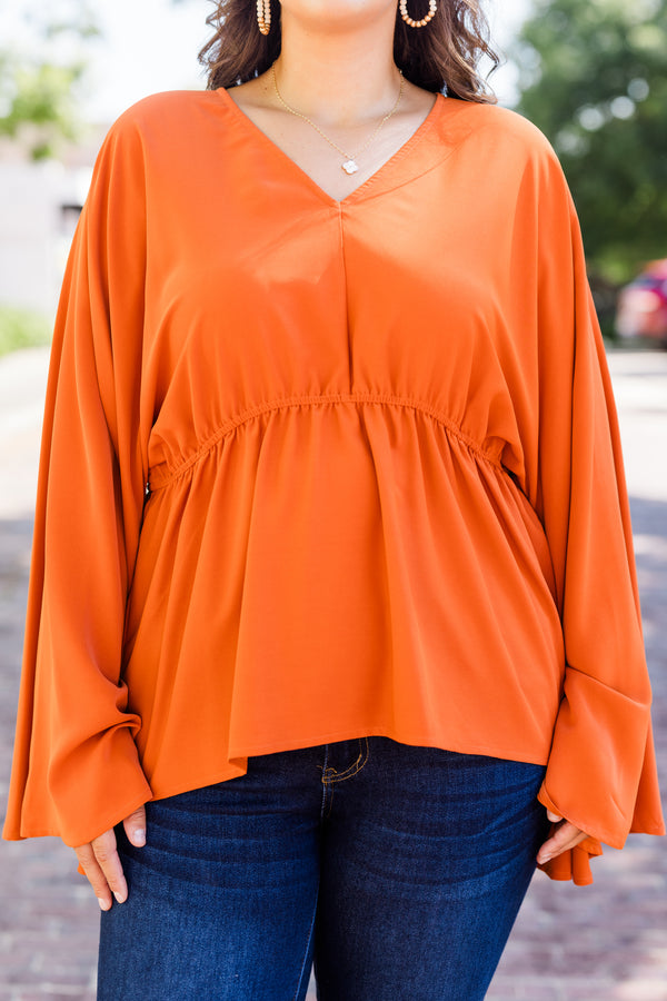 Chic Soul plus size clothing, orange long sleeve flowy top with v neckline and synched waist detail with bell sleeves